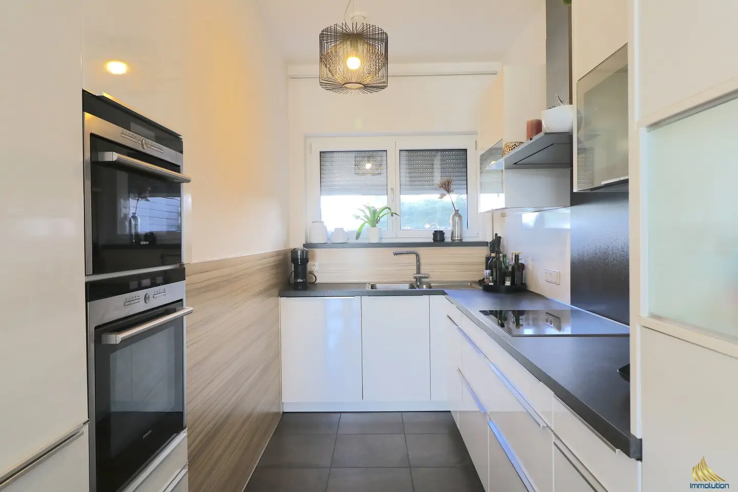 High-quality terraced house with south garden and distant view