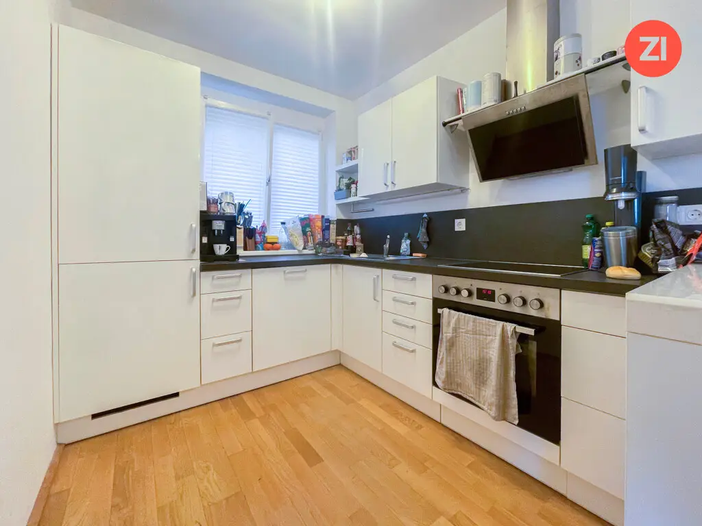 Lichtdurchflutete Wohnung mit Privatgarten und Einzelgarage