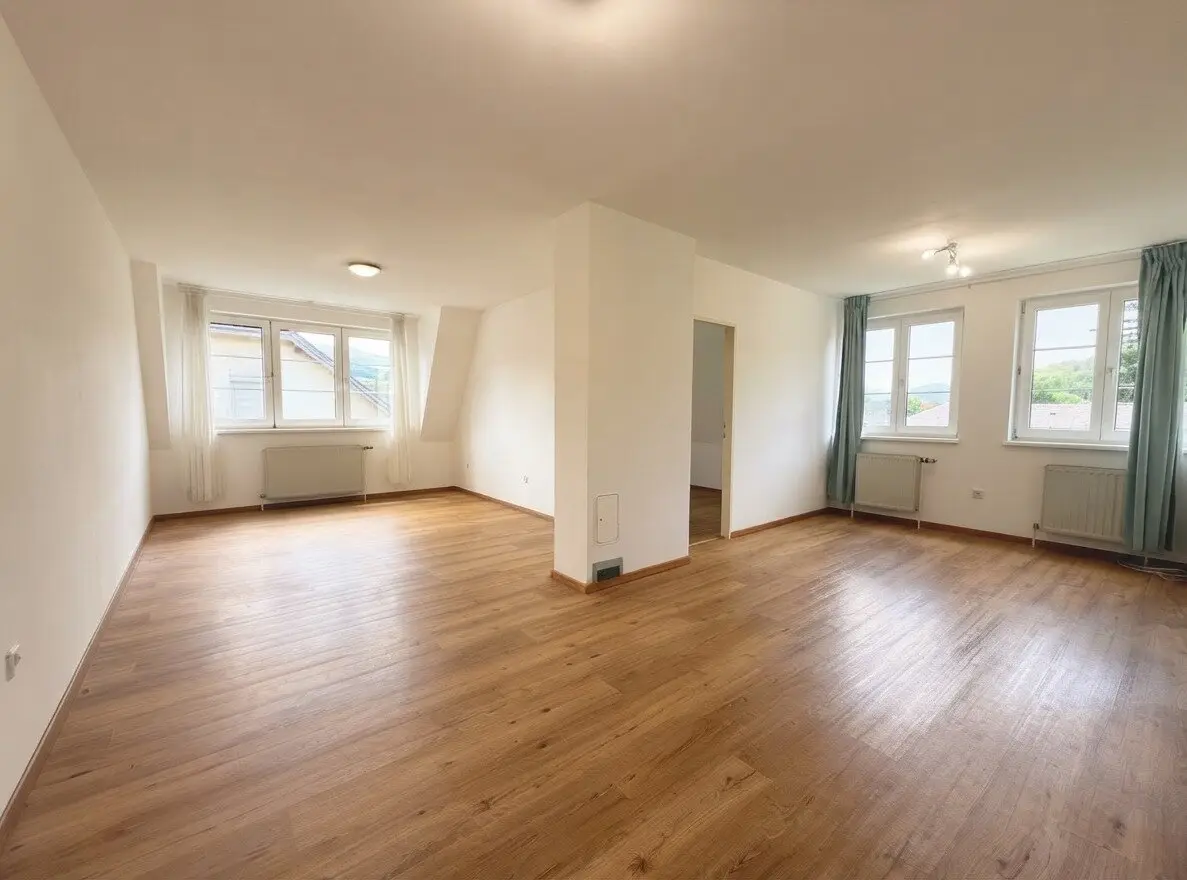 Bright attic apartment with distant view and garage parking space