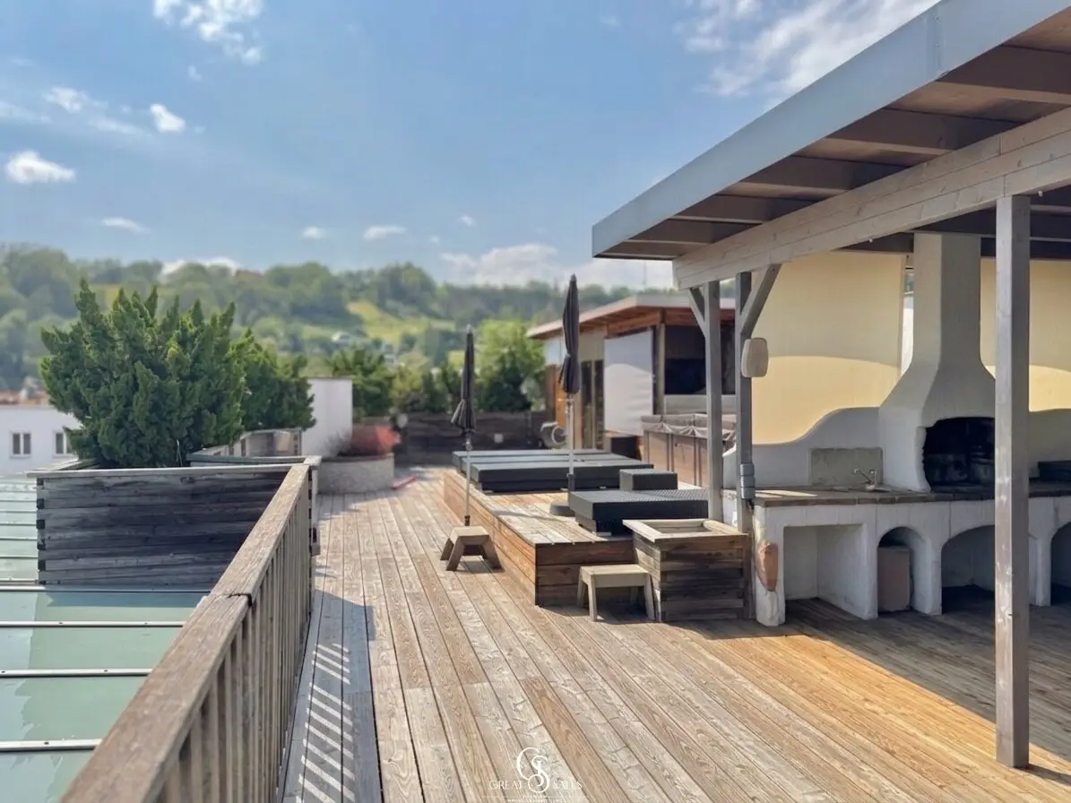 Exclusive penthouse with private approx. 140 m² roof terrace, swimspa and sauna south of Graz