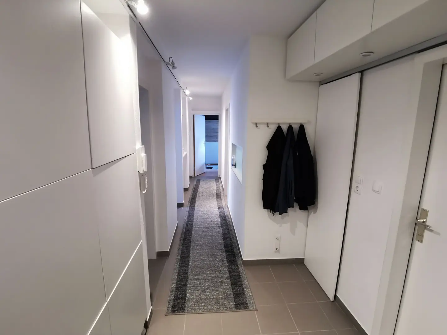 Zentrale Wohnung mit Wintergarten und Tiefgaragenplatz