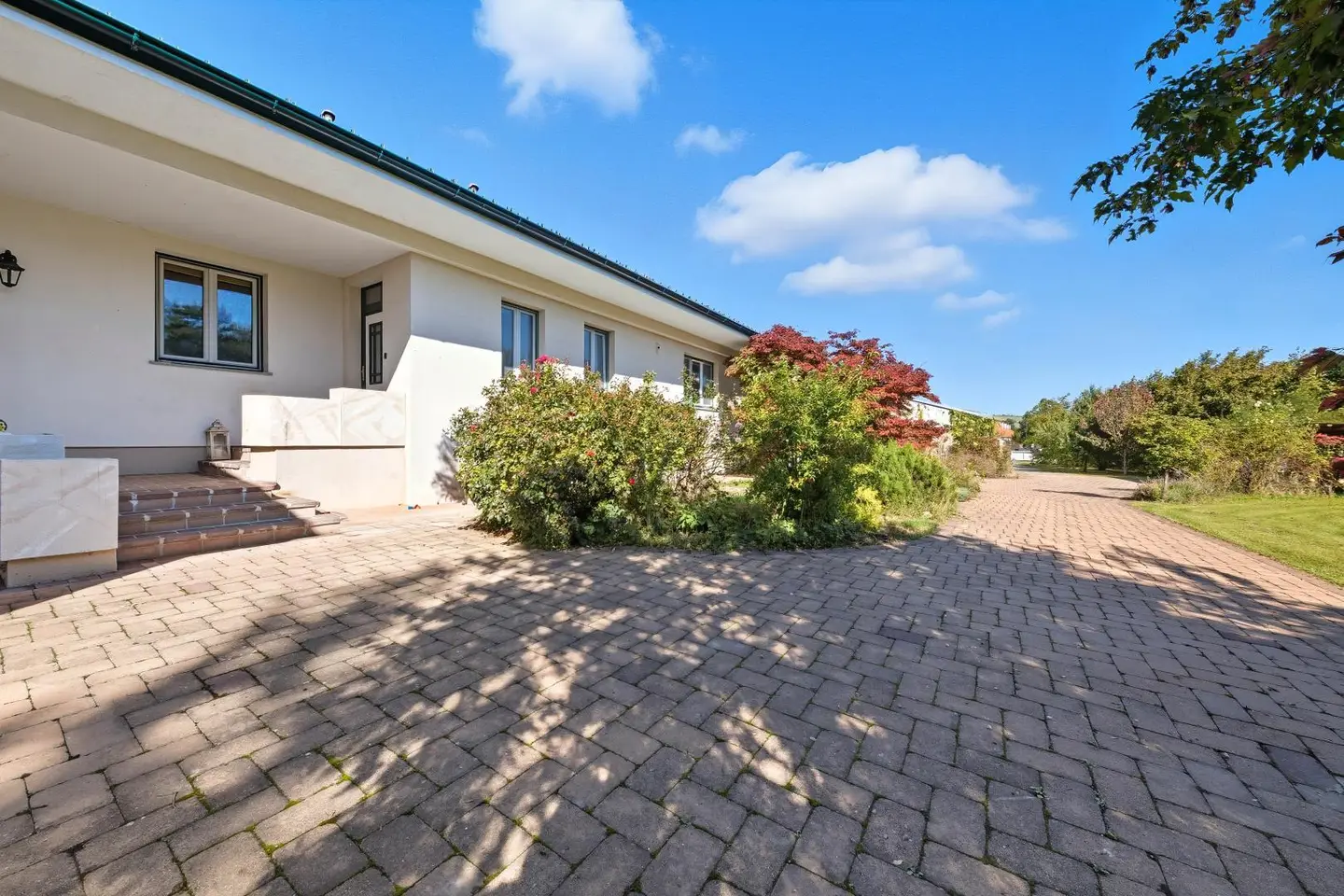Familienwohnung mit Wintergarten und Garten