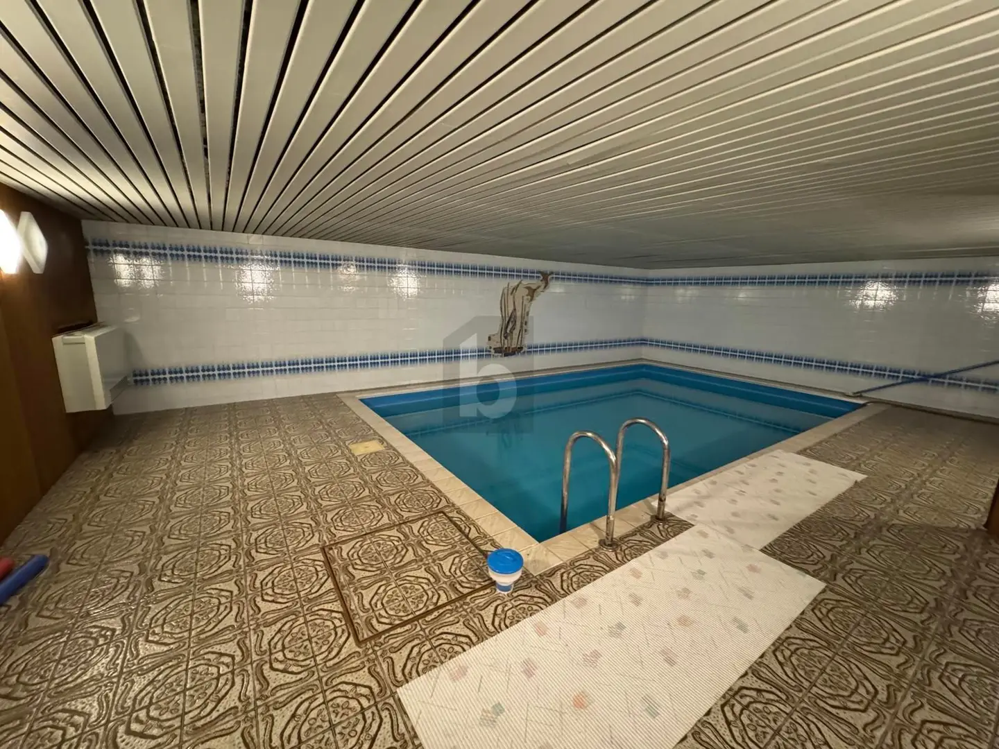 Family apartment in park like garden with indoor pool