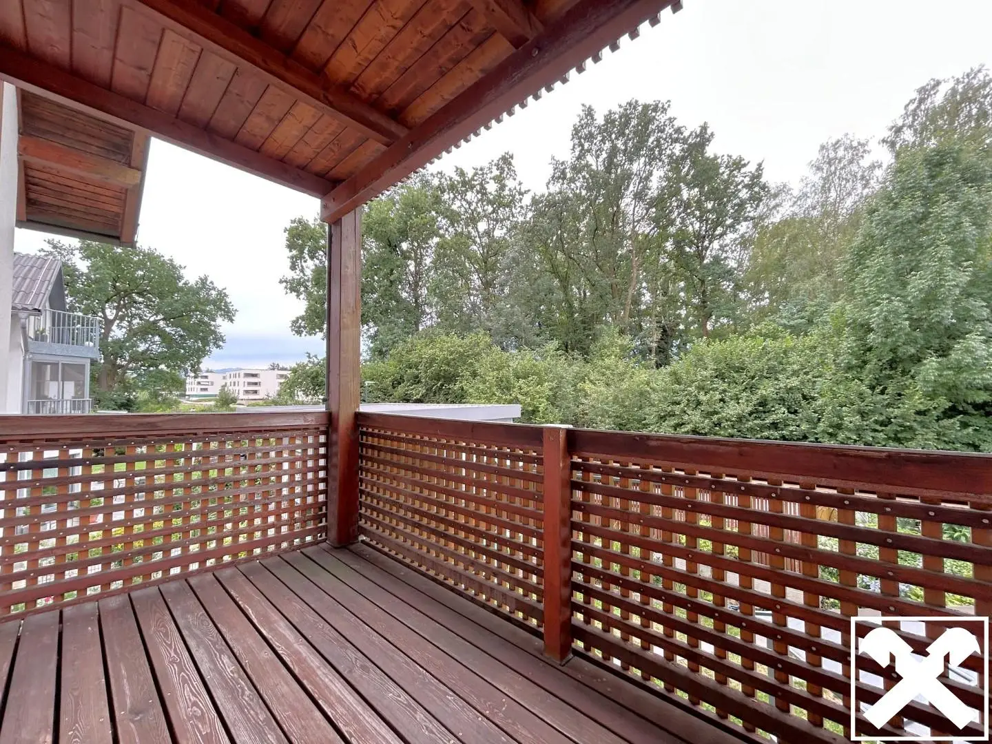 Bright apartment in south corner location with covered balcony