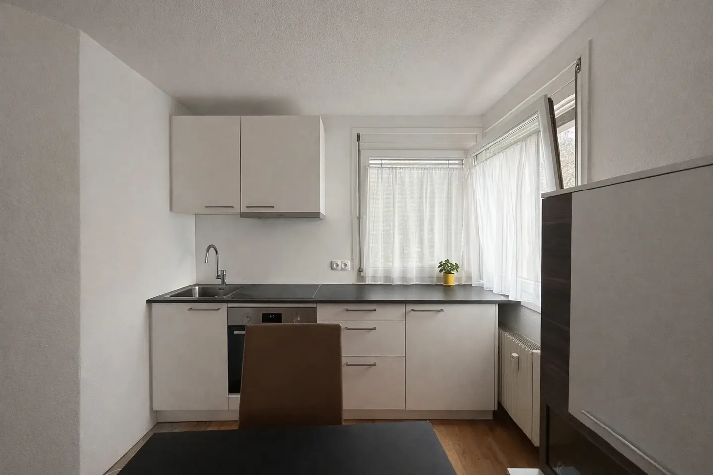 Kompakte Wohnung mit Balkon und Tiefgarage