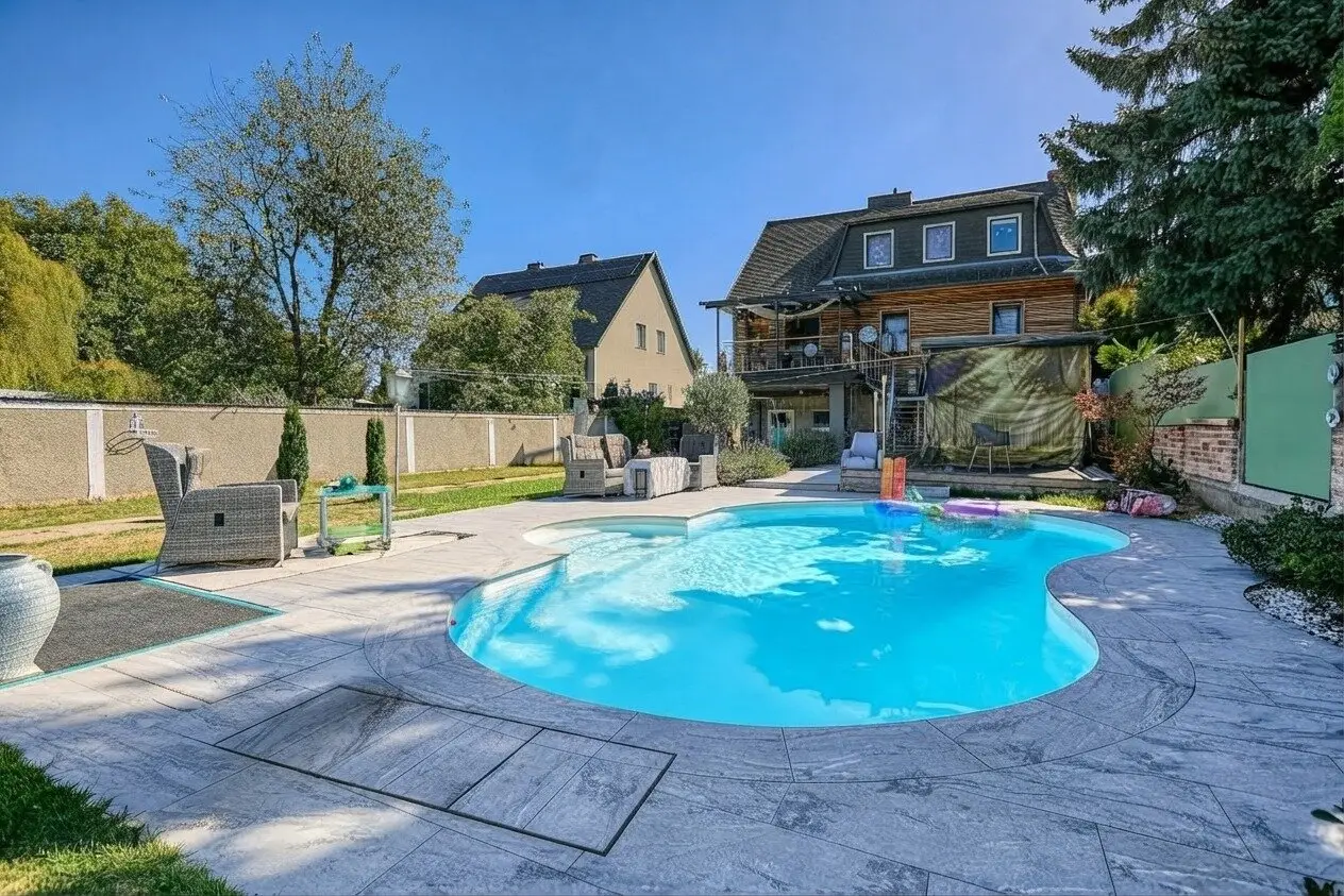 +NEU+ Ein traumhaftes Zuhause, viele Möglichkeiten – charmantes Familienhaus mit Salzwasserpool und zwei Wohneinheiten +