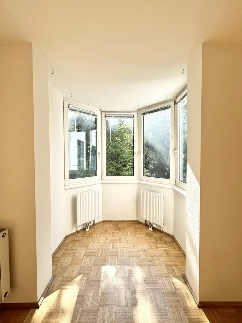 Traumblick in Gartenlandschaft! Südseitiger 2-Zimmer-Neubau mit charmantem Erker! Garagenoption!