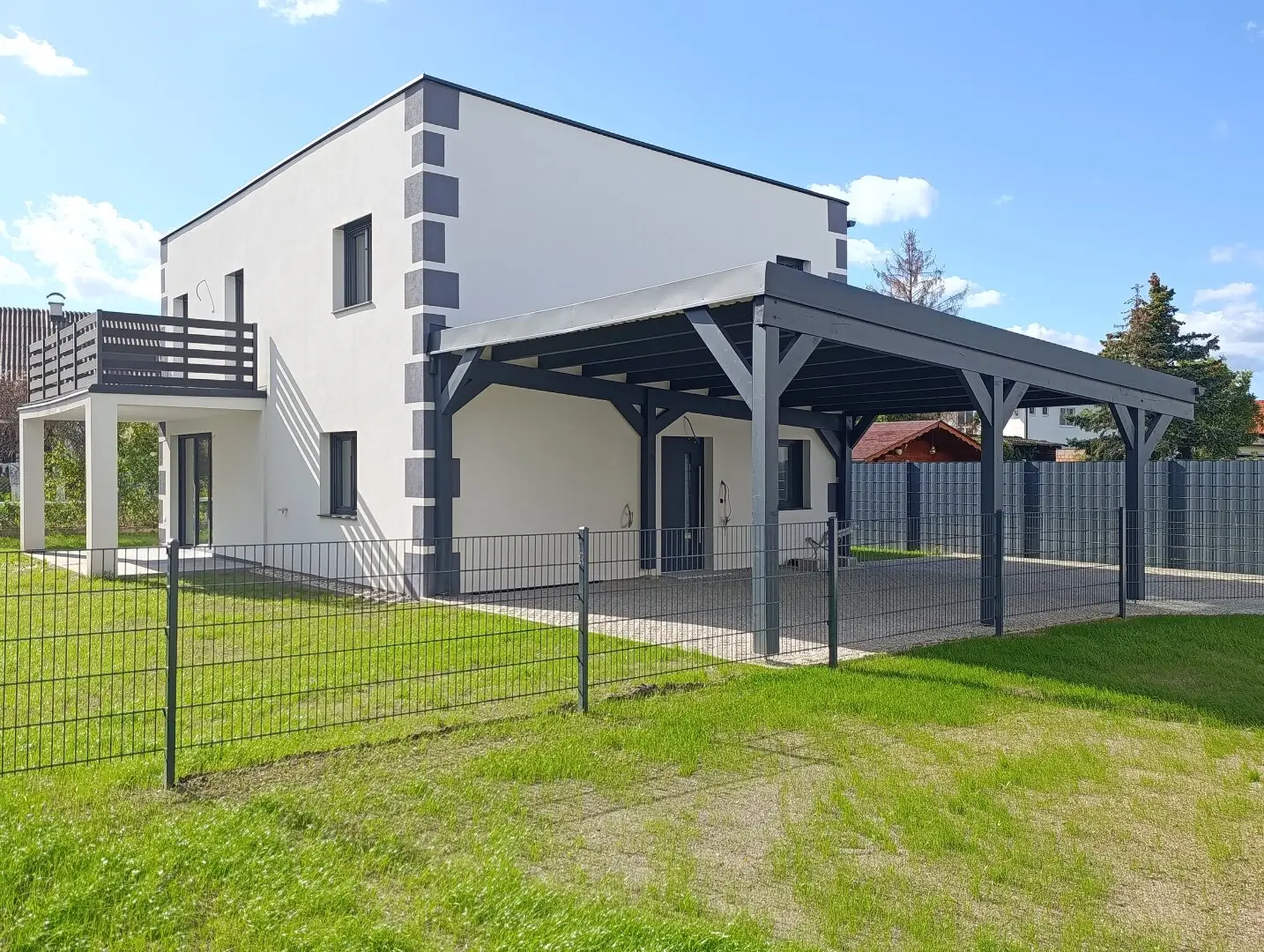 Turnkey single-family houses with garden, terraces & carport in Neunkirchen