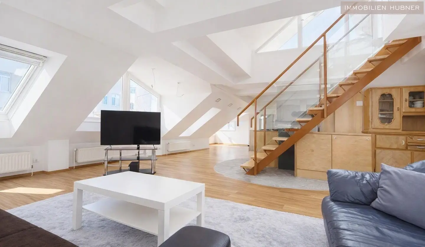 Dachgeschosswohnung with spacious terrace and air conditioning