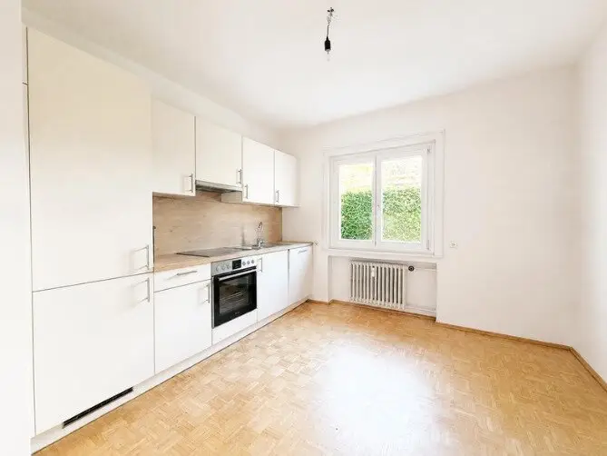 Inspiring 4.5-room period apartment with garage, garden and balcony