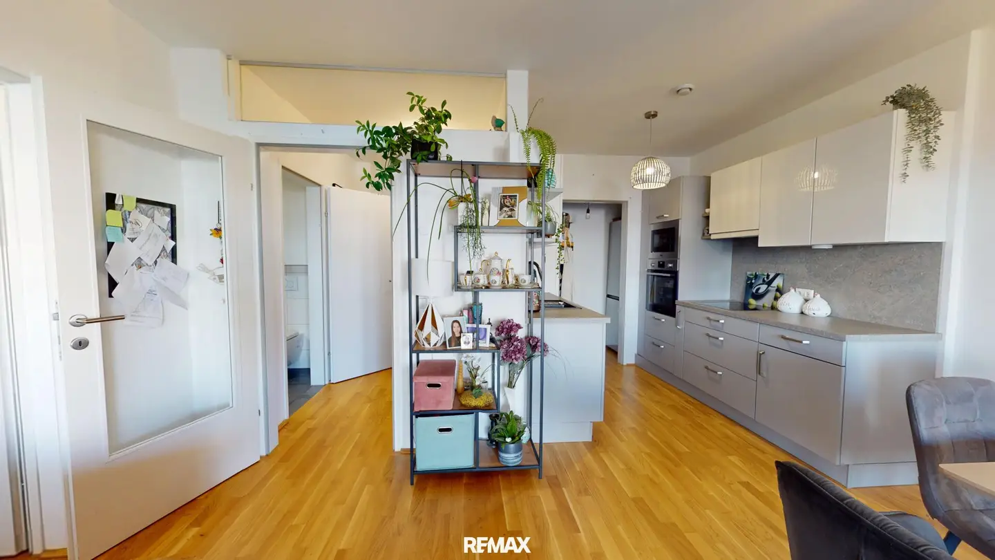 Modern 2-room residential gem with balcony &amp; underground parking space in Wels