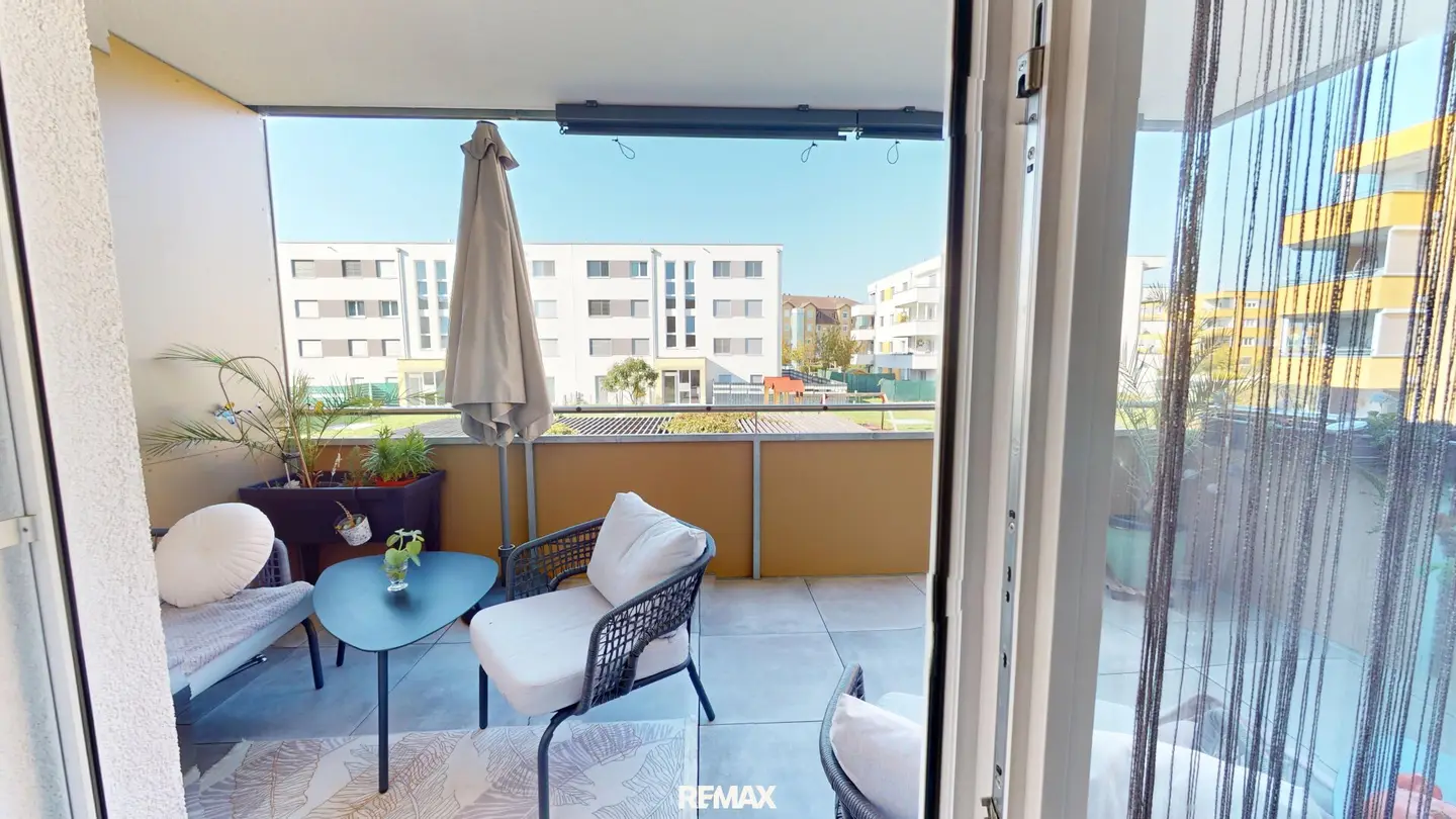 Modern 2-room residential gem with balcony &amp; underground parking space in Wels