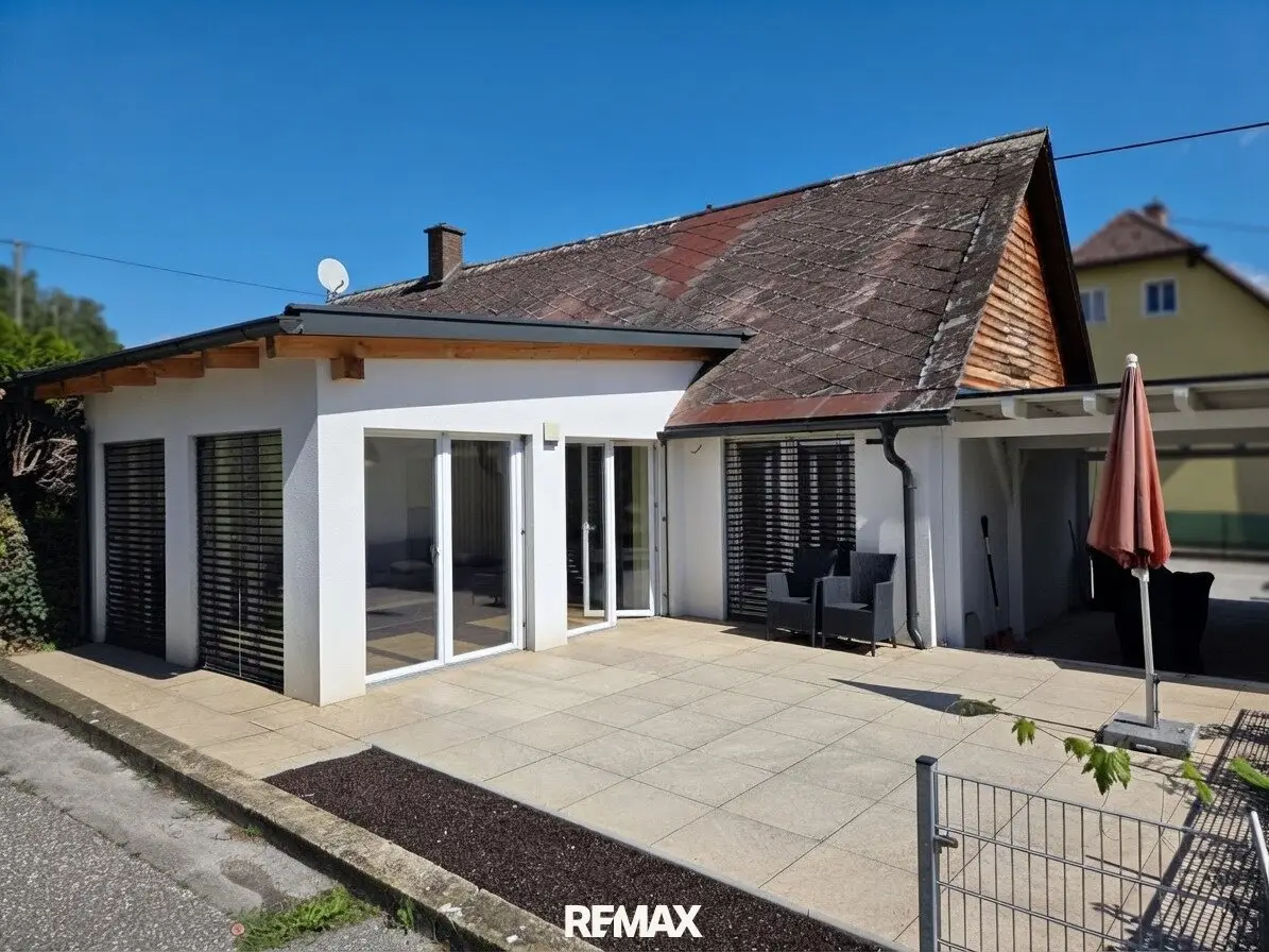 Extensively refurbished modern house with compact living area and generous terrace