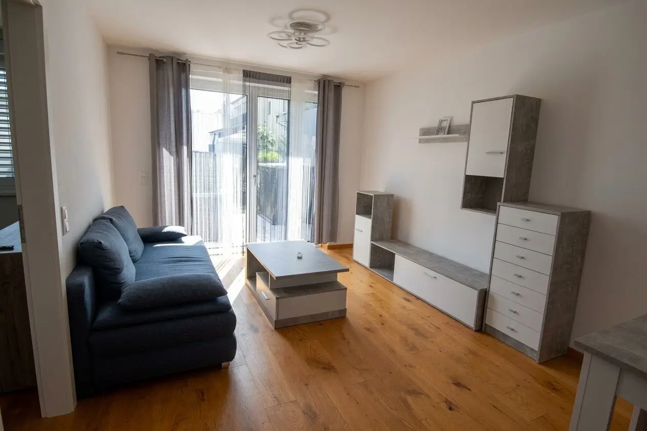 Moderne 2-Zimmer-Gartenwohnung mit Terrasse &amp; Carport in begehrter Ruhelage