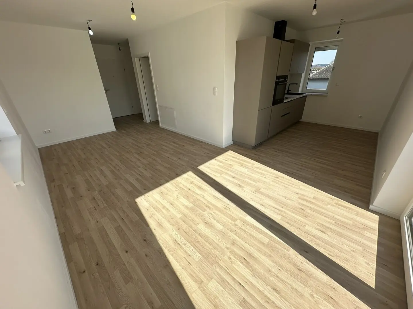 Top 25: New building: Stylish apartment with balcony, heat pump and elevator - first occupancy!