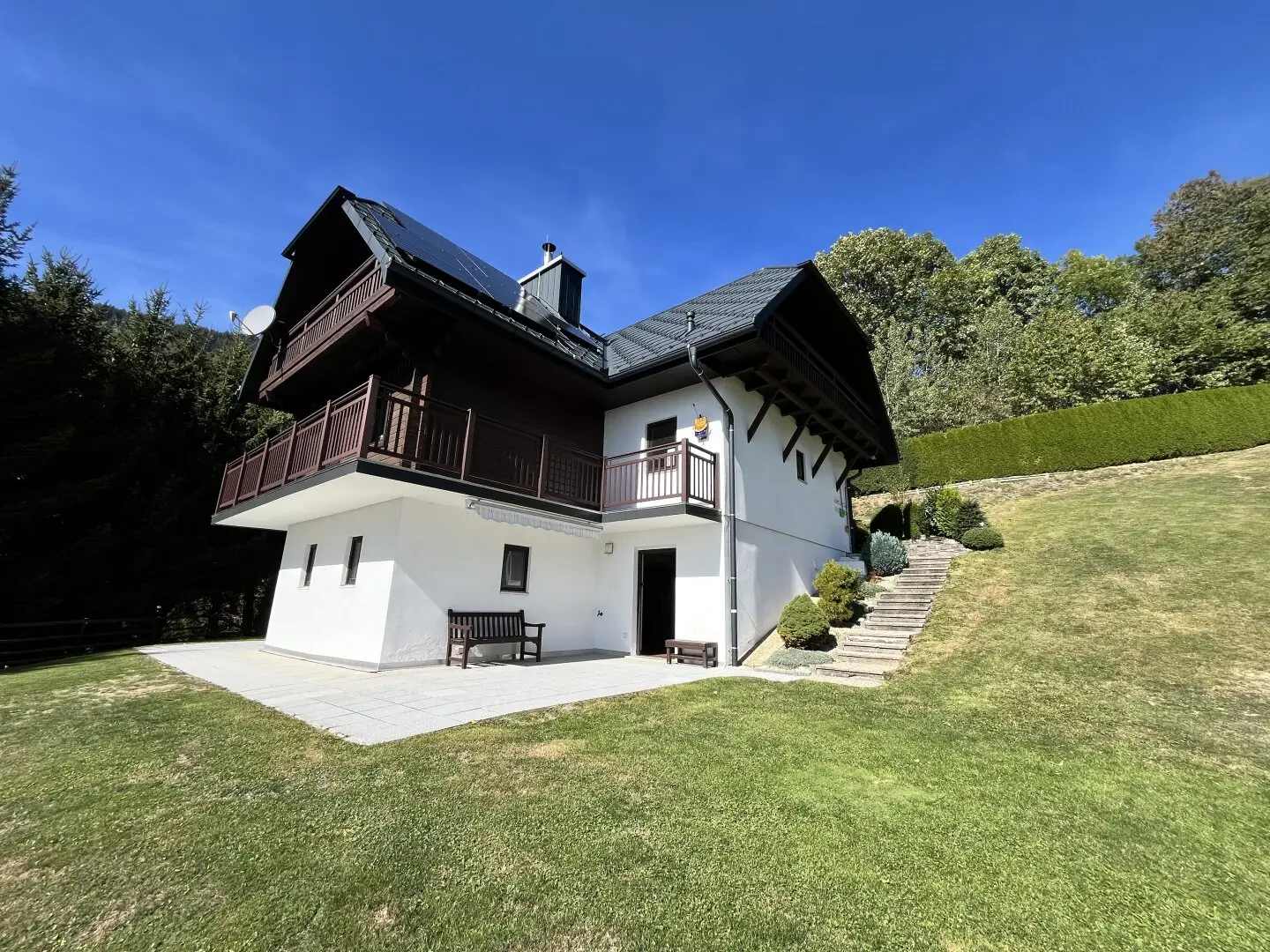 St. Radegung near Graz: A home with distant view – charming wooden house at the foot of the Schöckel in a magnificent elevated position only about 20 minutes from Graz