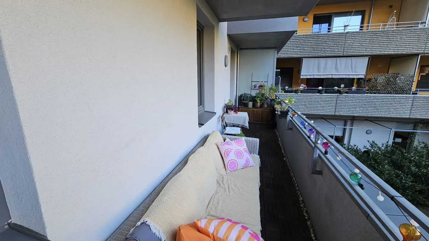 Courtyard facing apartment with large balcony