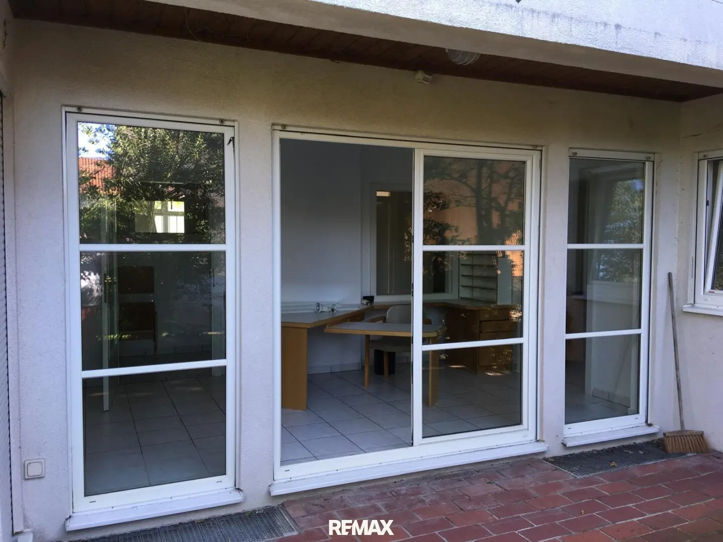 Residential and commercial building with medical practice rooms