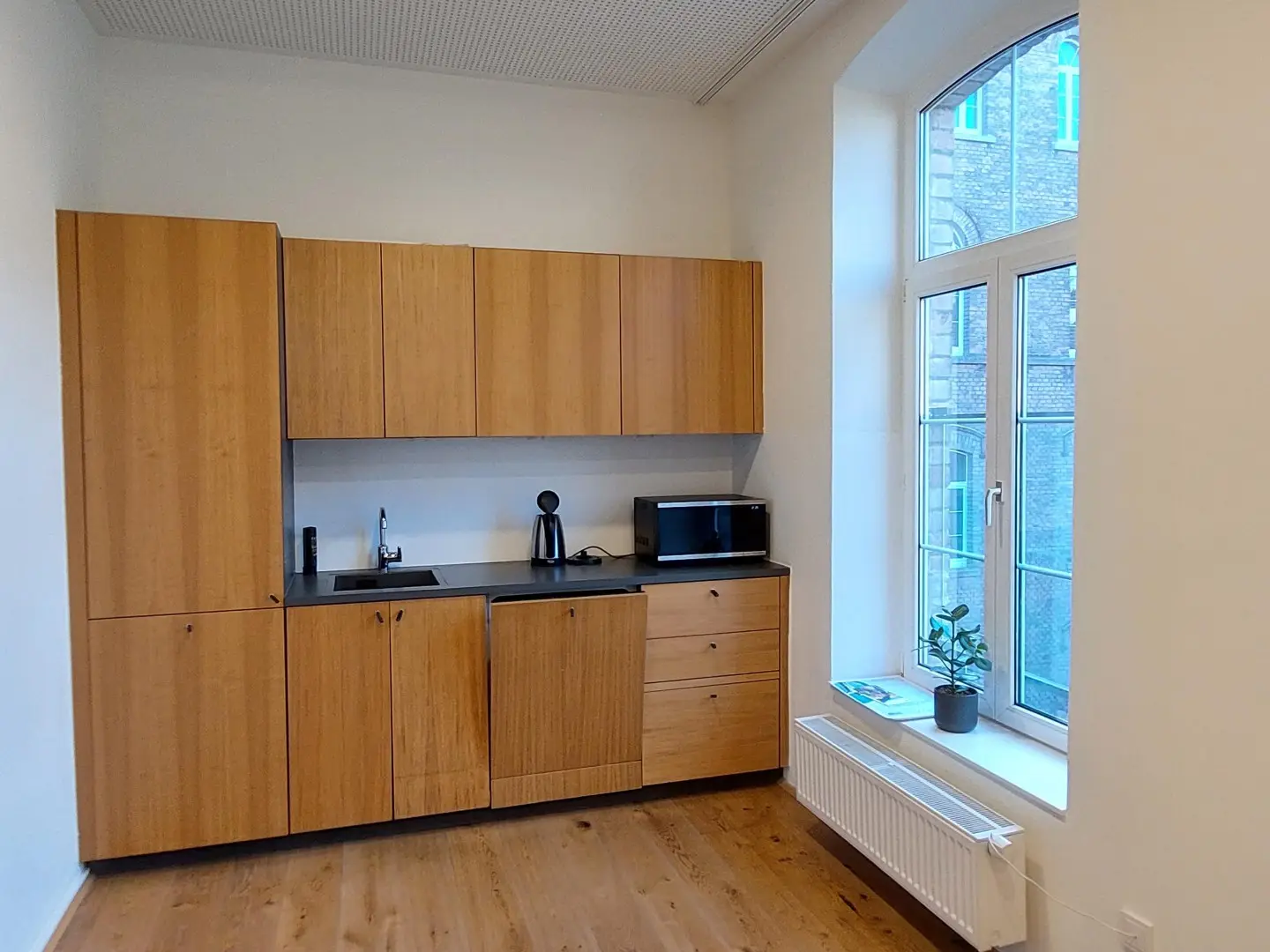 Klimatisierte Wohnung lichtdurchflutet im historischen Ensemble