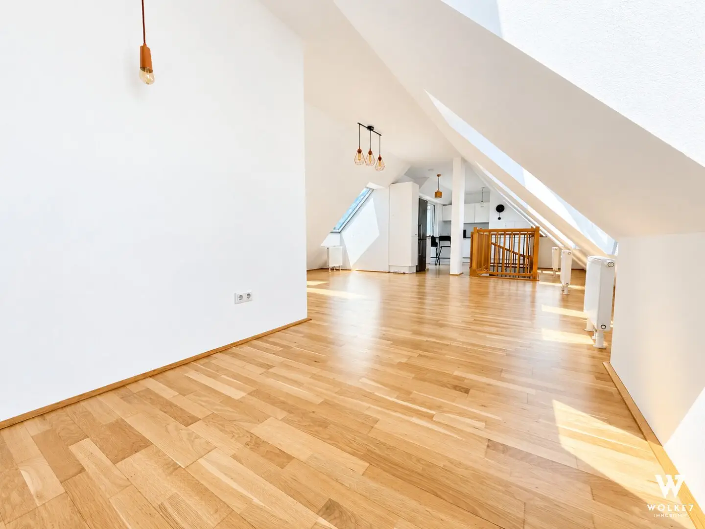 Modern top-floor maisonette with roof terrace and distant view