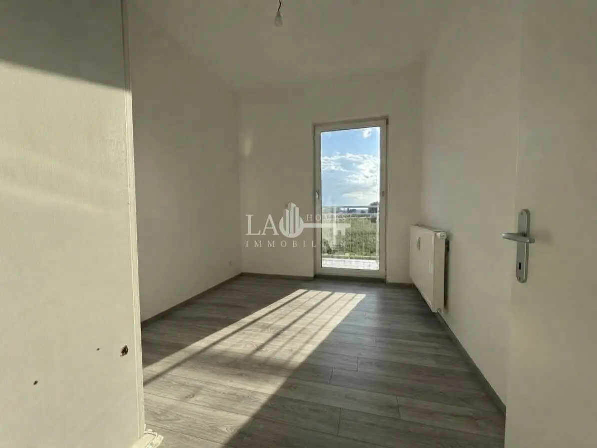 Charmante 4-Zi-Wohnung mit Balkon und Parkplatz