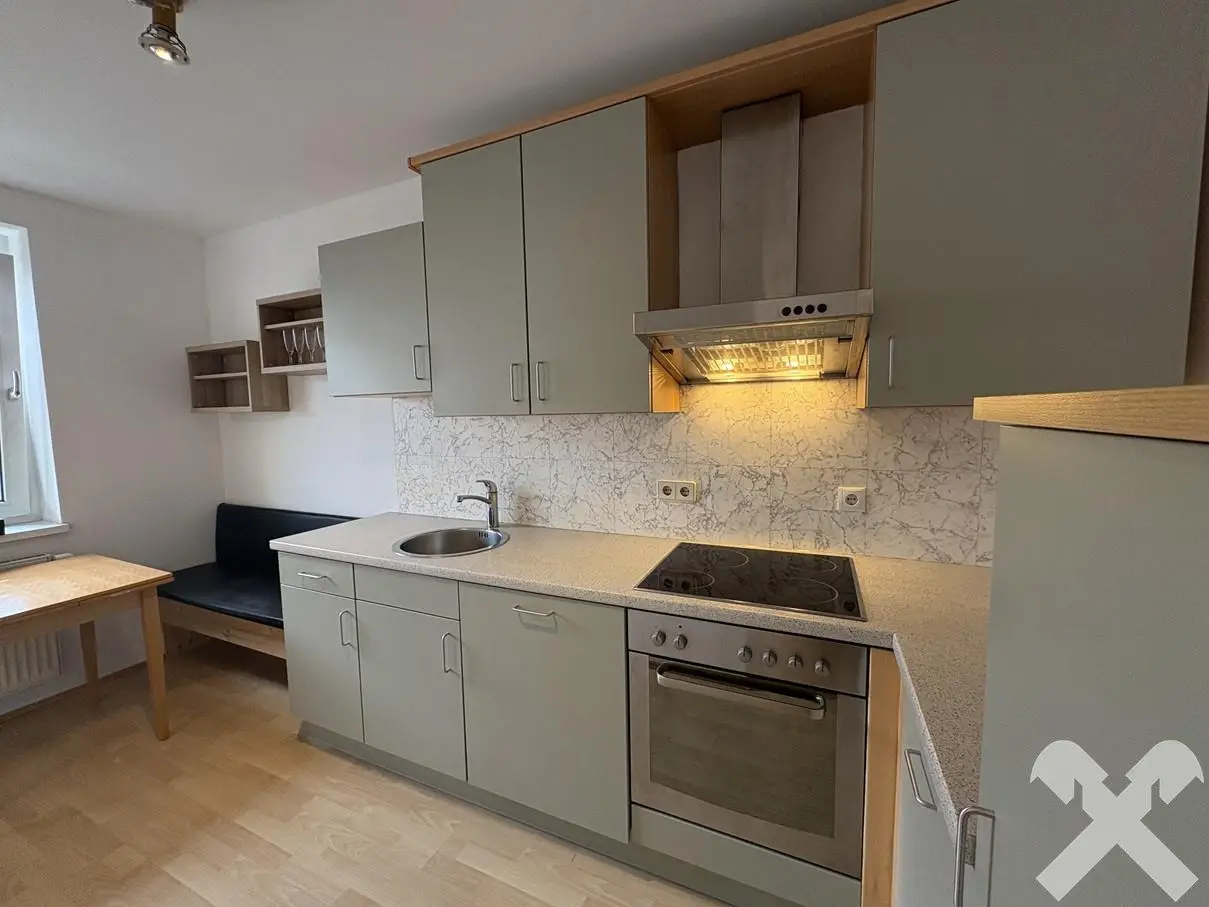 Helle Wohnung mit Westbalkon und Tiefgaragenplatz