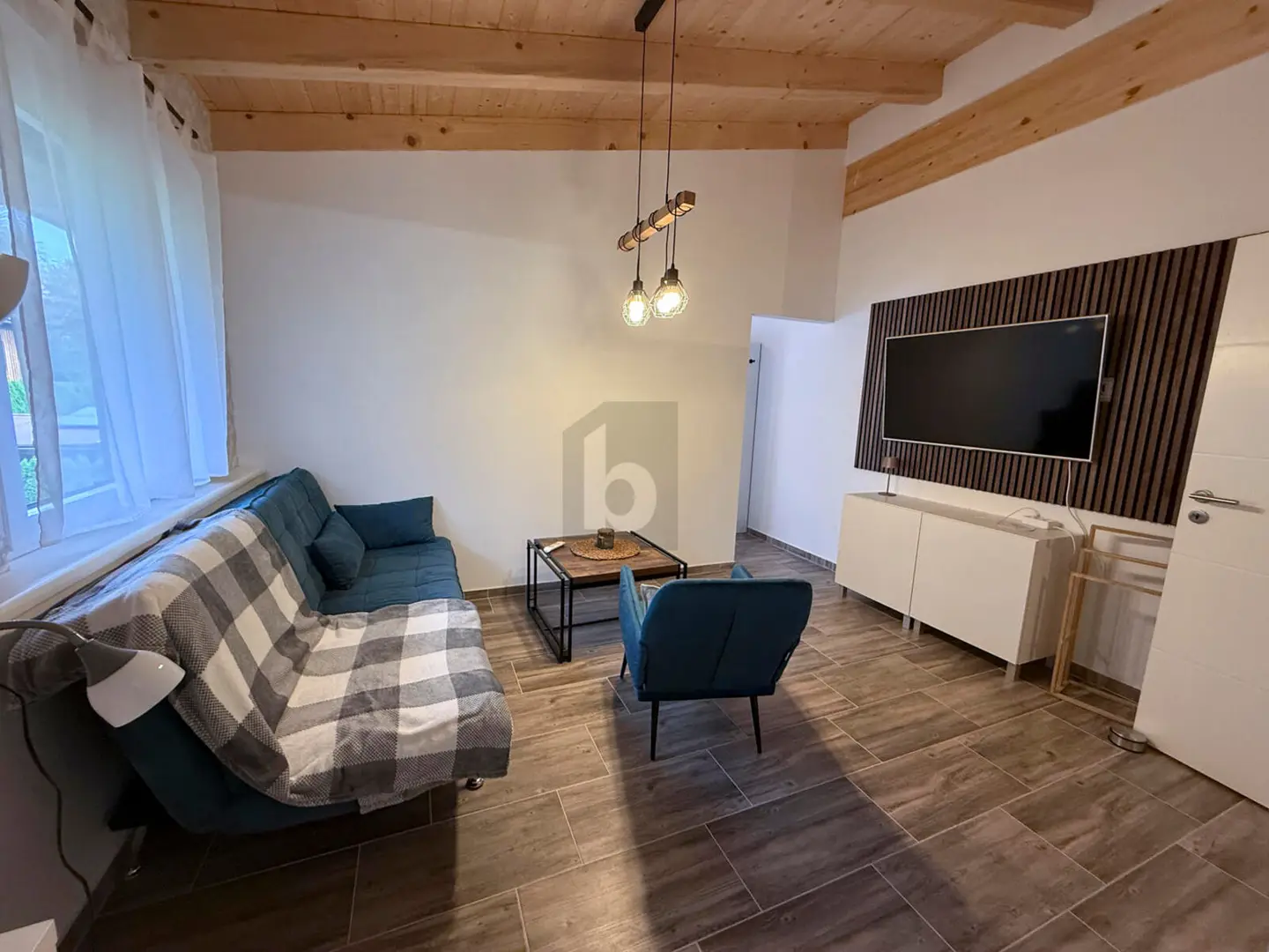 Holiday apartment in a wooden house with guest apartments near Presseggersee