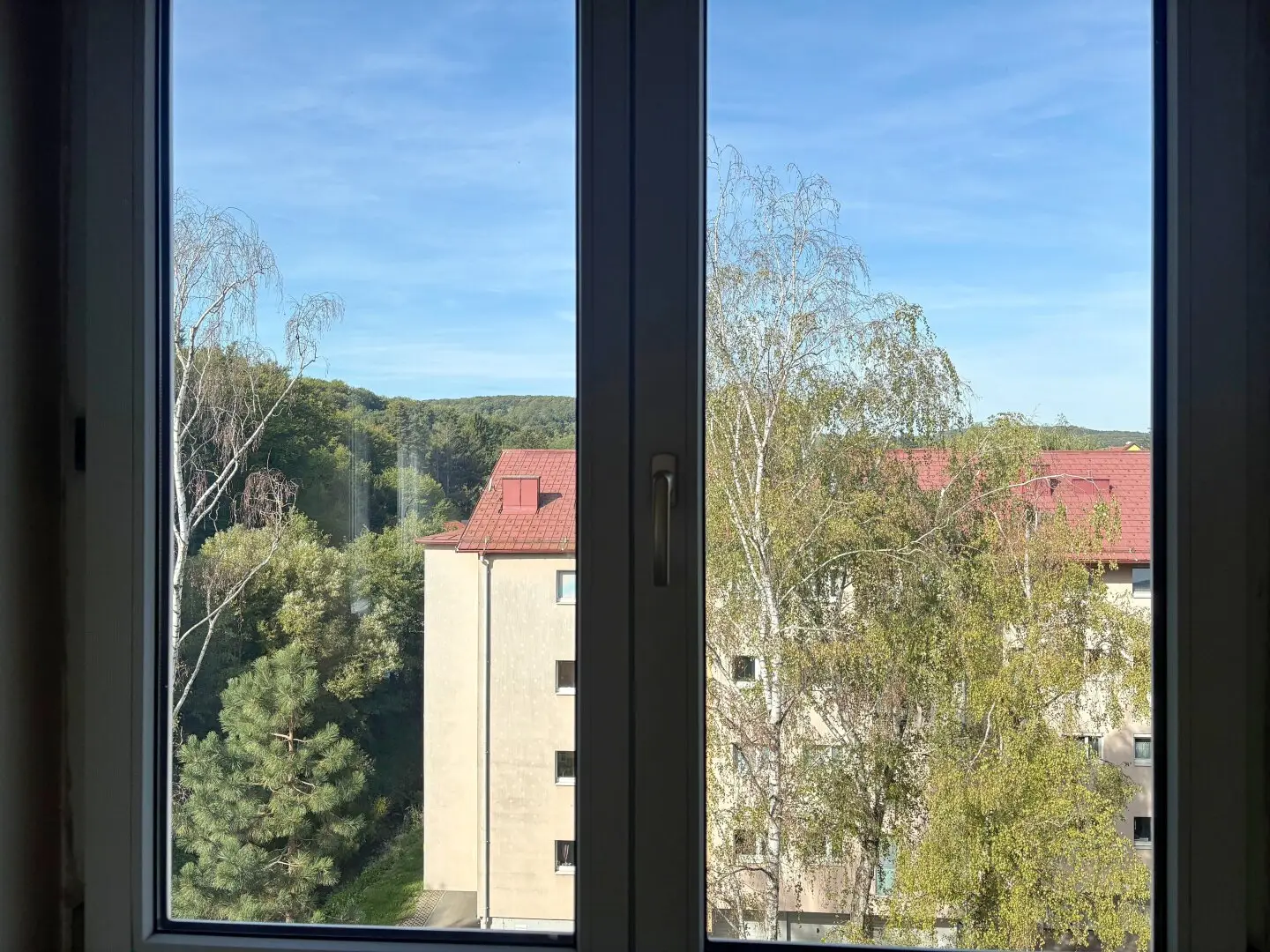 Low-energy house: Enchanting distant view – 3-room apartment with heated loggia and parking space