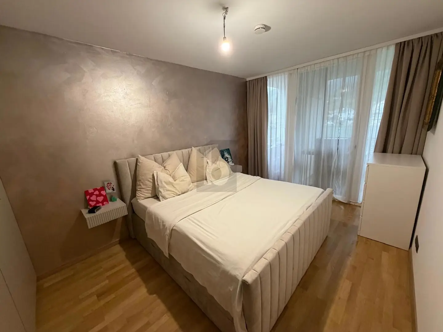Wohnung with large balcony and underground parking