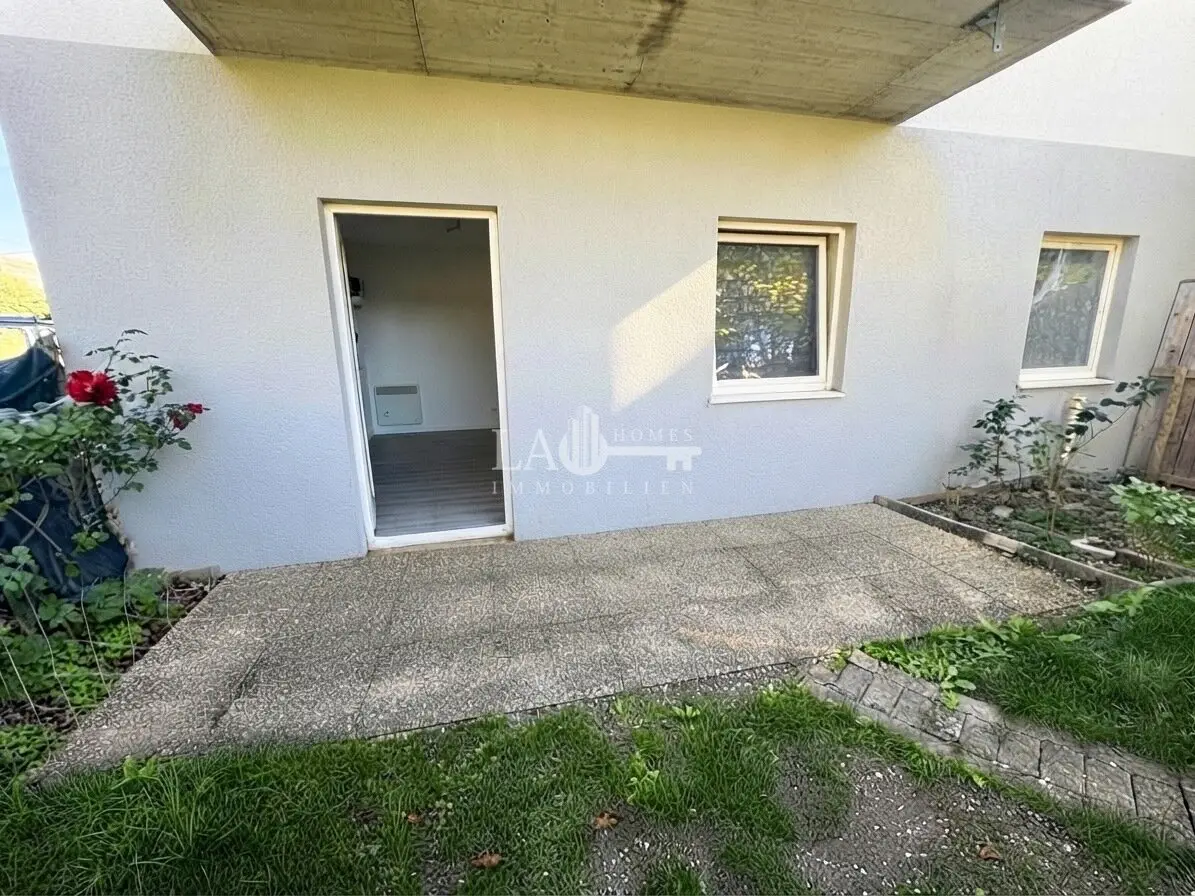 Charming 4-room garden apartment in Wels with parking