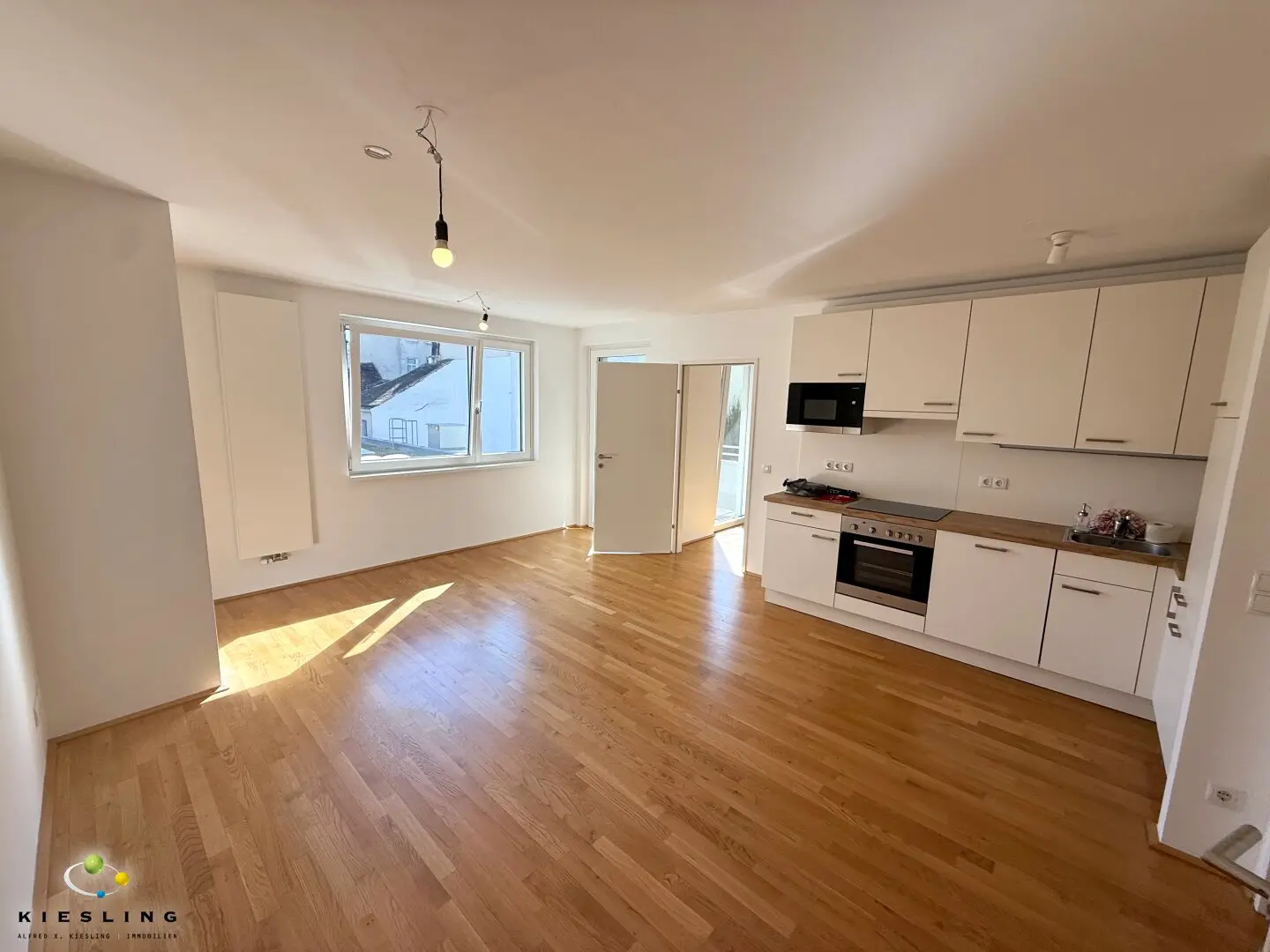 2 Zimmer-Wohnung in ruhiger Lage, Süd-Ost-Balkon, voll ausgestatteter Küche und Gemeinschaftsgarten T14