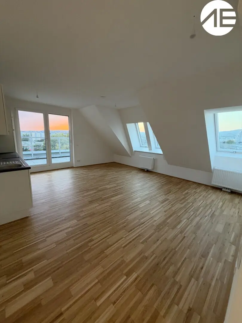 Erstbezug im Dachgeschoss: 4-Zimmer-Wohnung mit Terrasse und Balkon