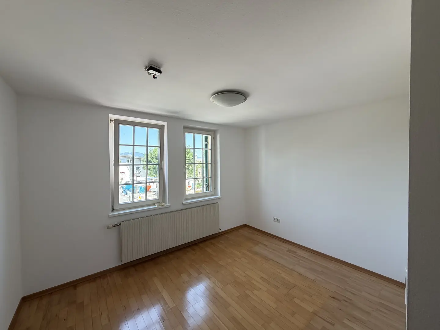 Zentrale lichtdurchflutete Wohnung mit Gemeinschaftsgarten