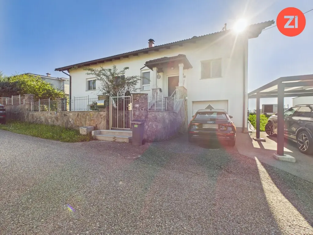 Renovierte Familienwohnung mit Garten und Garage