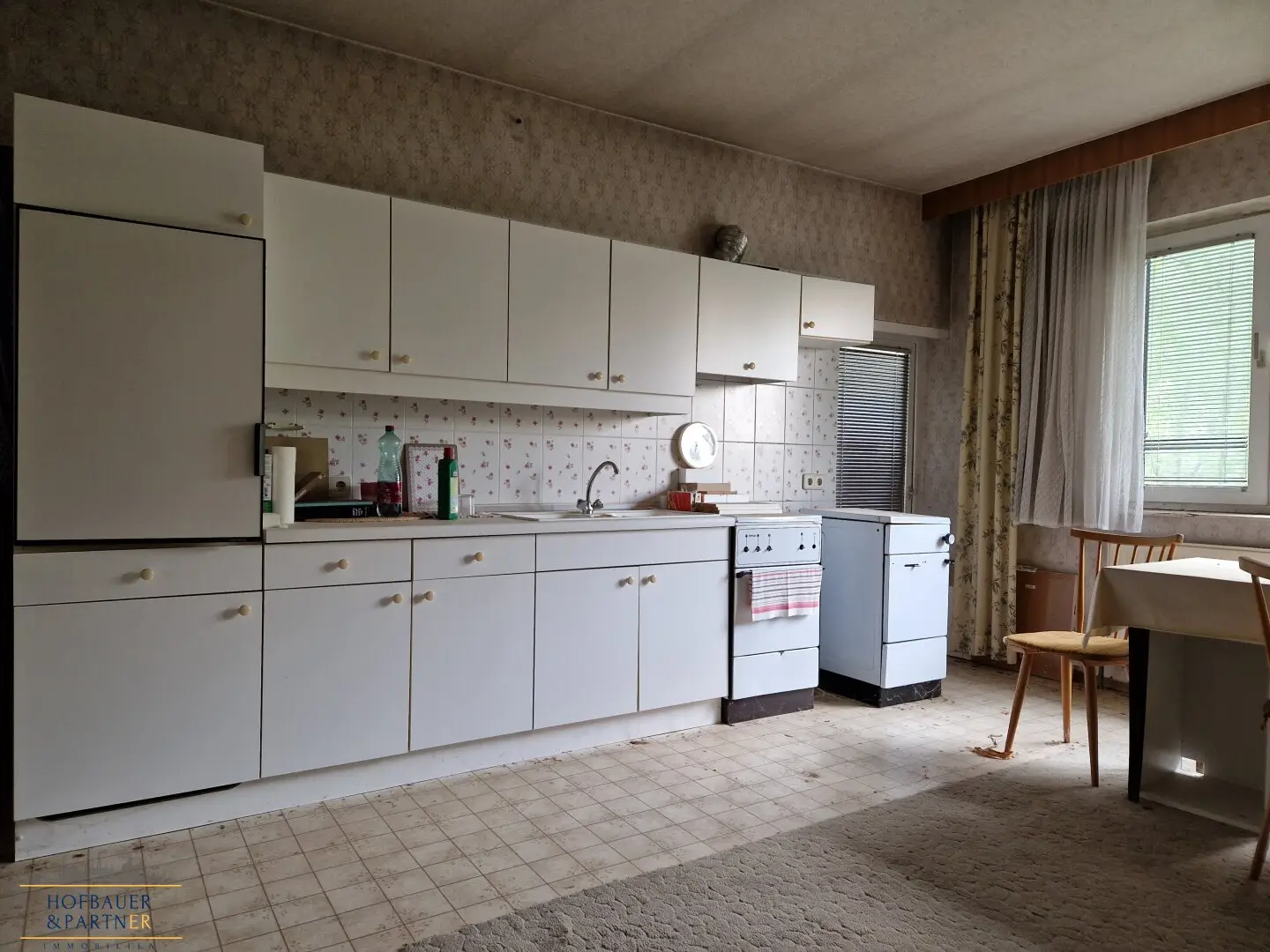 Sanierungsbedürftiges Einfamilienhaus mit Entwicklungspotenzial in Hausbrunn