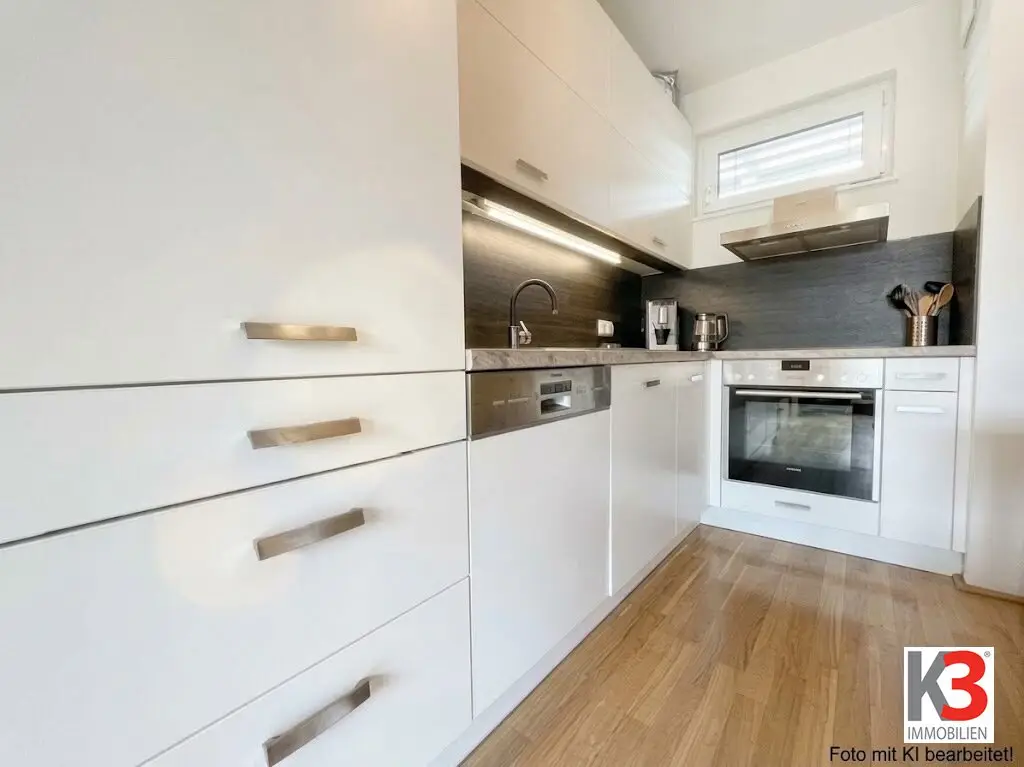 K3 - LIKE-NEW 2-room apartment with approx. 23 m² roof terrace Own underground parking space + own carport space already included!
