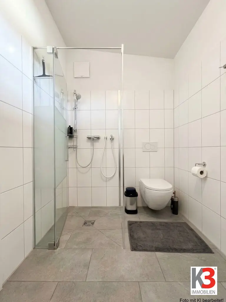 K3 - LIKE-NEW 2-room apartment with approx. 23 m² roof terrace Own underground parking space + own carport space already included!