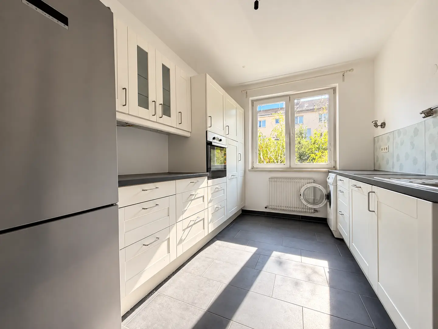 Light filled Wohnung with open fireplace in green quiet location