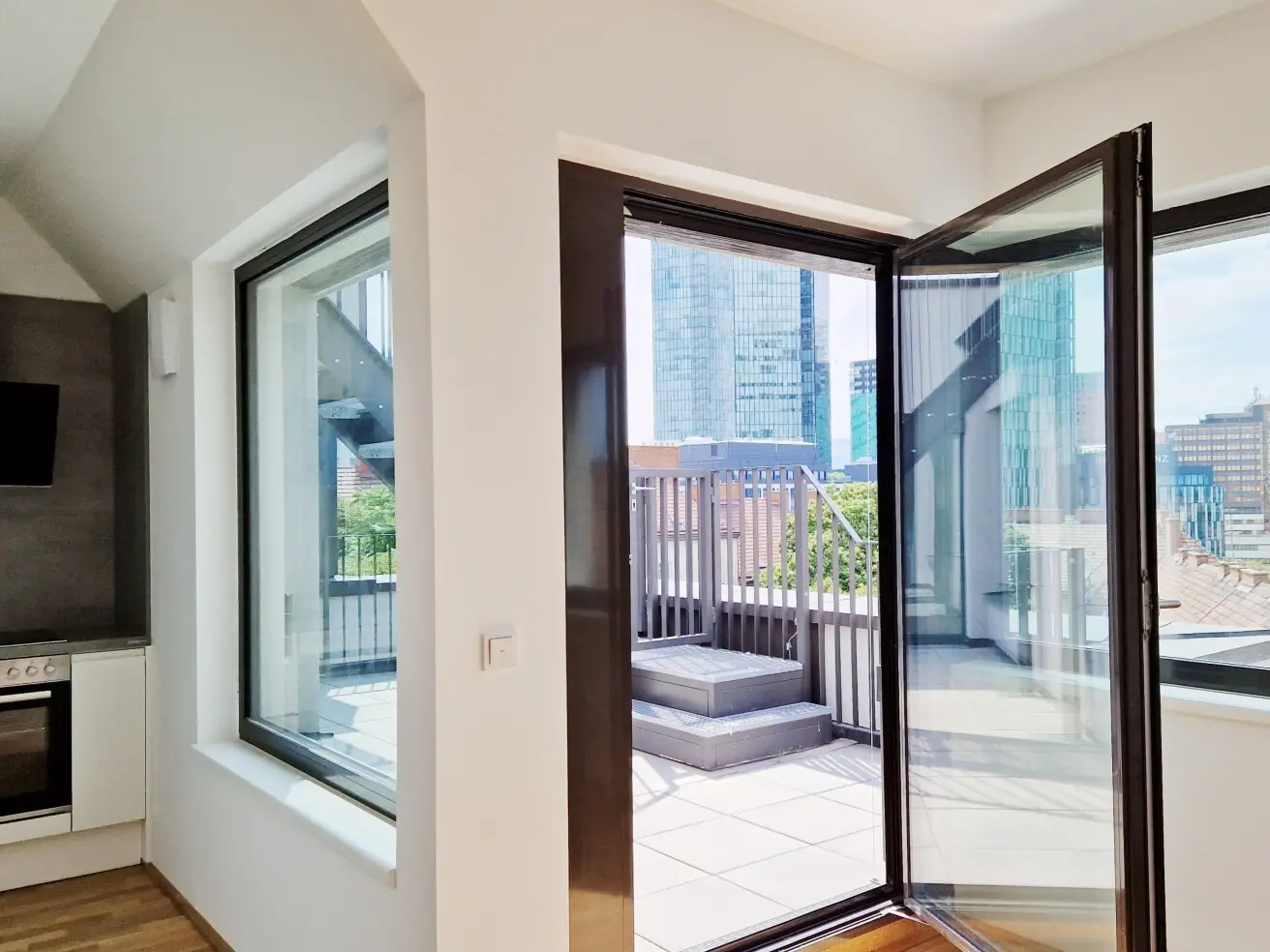 Dachgeschosswohnung mit privater Dachterrasse und Skylineblick