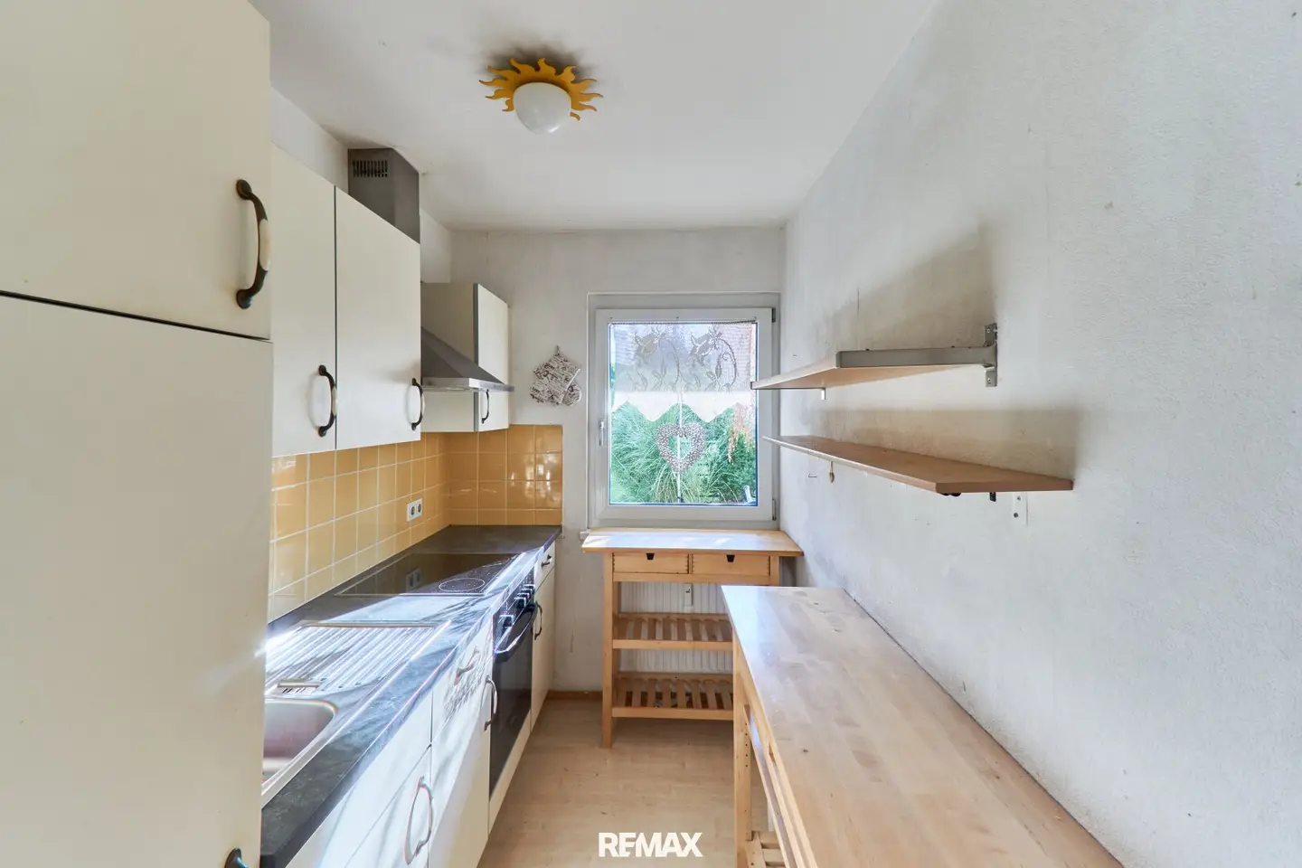 Hötting: 2-room garden apartment with underground parking space