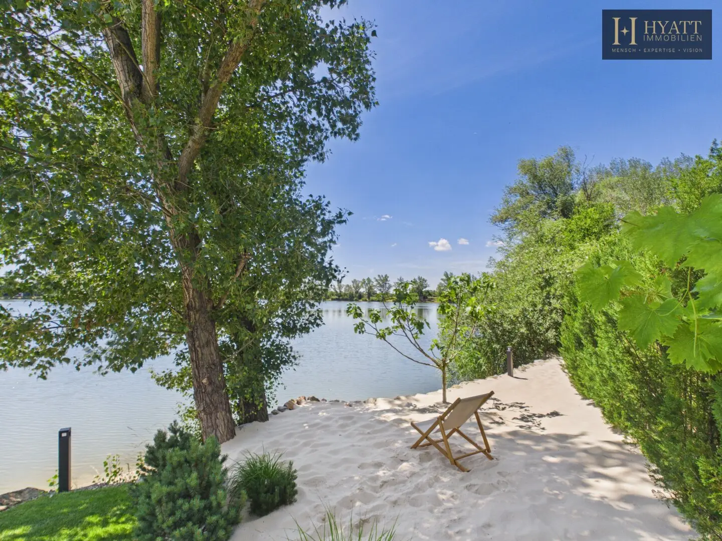 An Exceptional Waterfront Retreat with Private Beach and Unrivaled Privacy