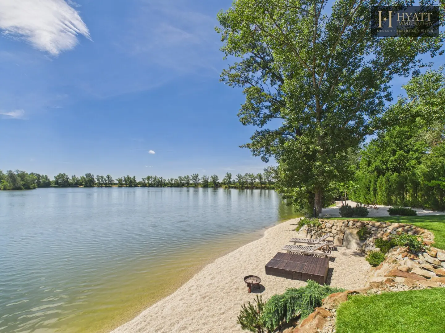 An Exceptional Waterfront Retreat with Private Beach and Unrivaled Privacy