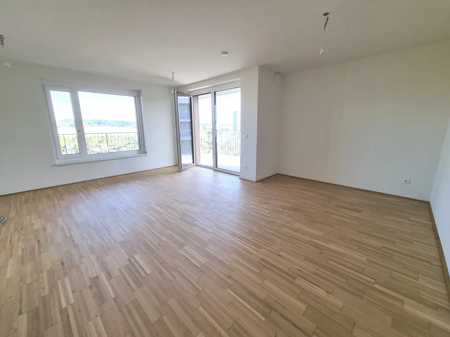 Helle Wohnung mit Balkon und Fußbodenheizung an der Mur