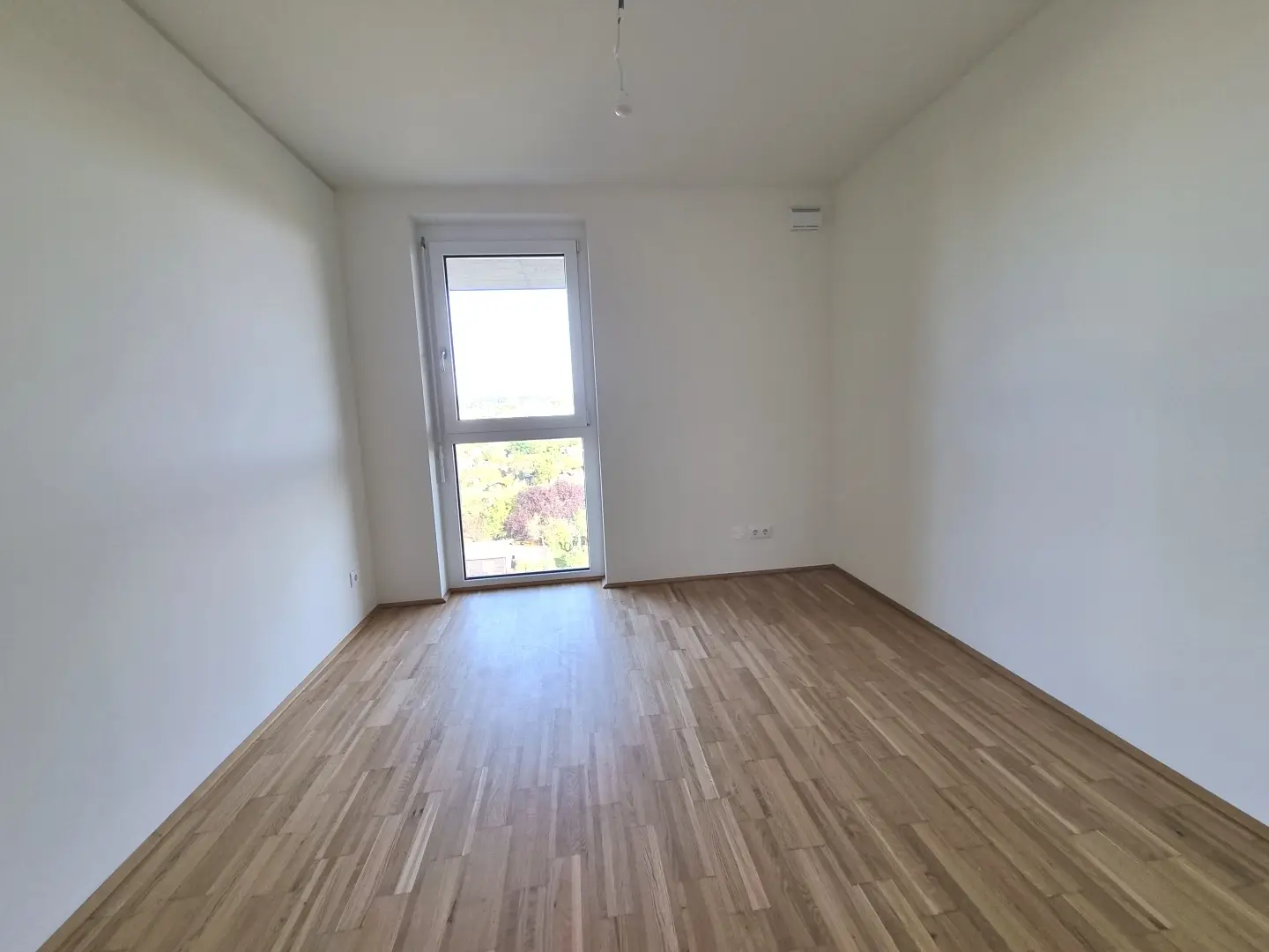 Helle Wohnung mit Balkon und Fußbodenheizung an der Mur