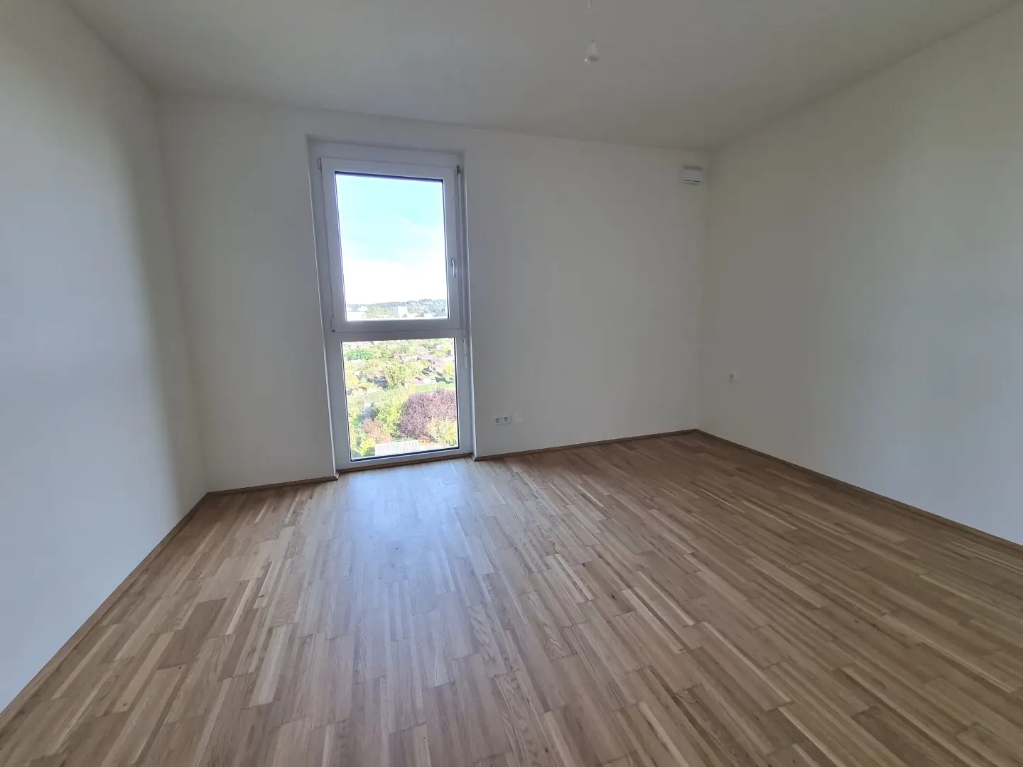 Nachhaltige lichtdurchflutete Wohnung mit Balkon und Lift