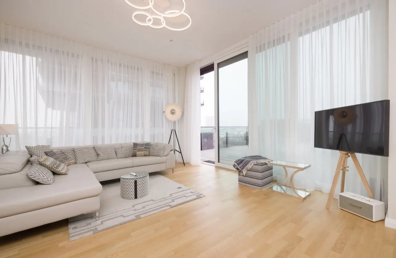 TRIIIPLE – Exclusive 2-room apartment with generous terrace and garage