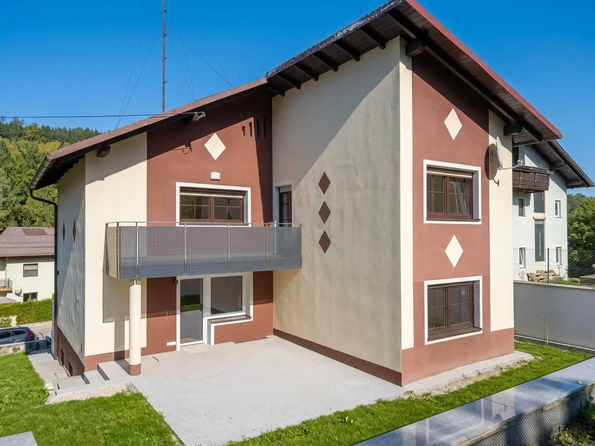 Wohnung mit Terrasse und eigenem Gartenanteil