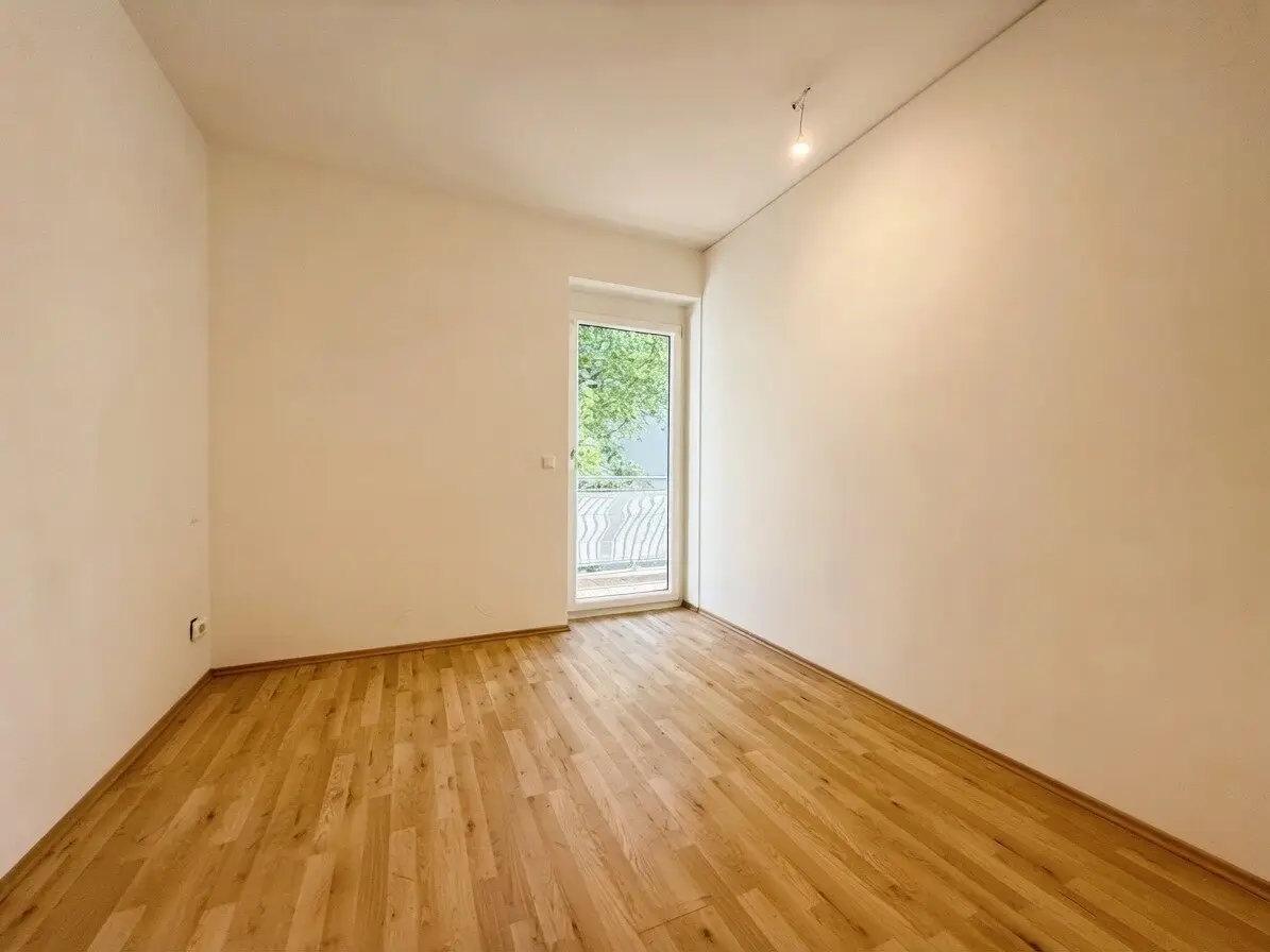 2-room apartment with spacious balcony and view of greenery