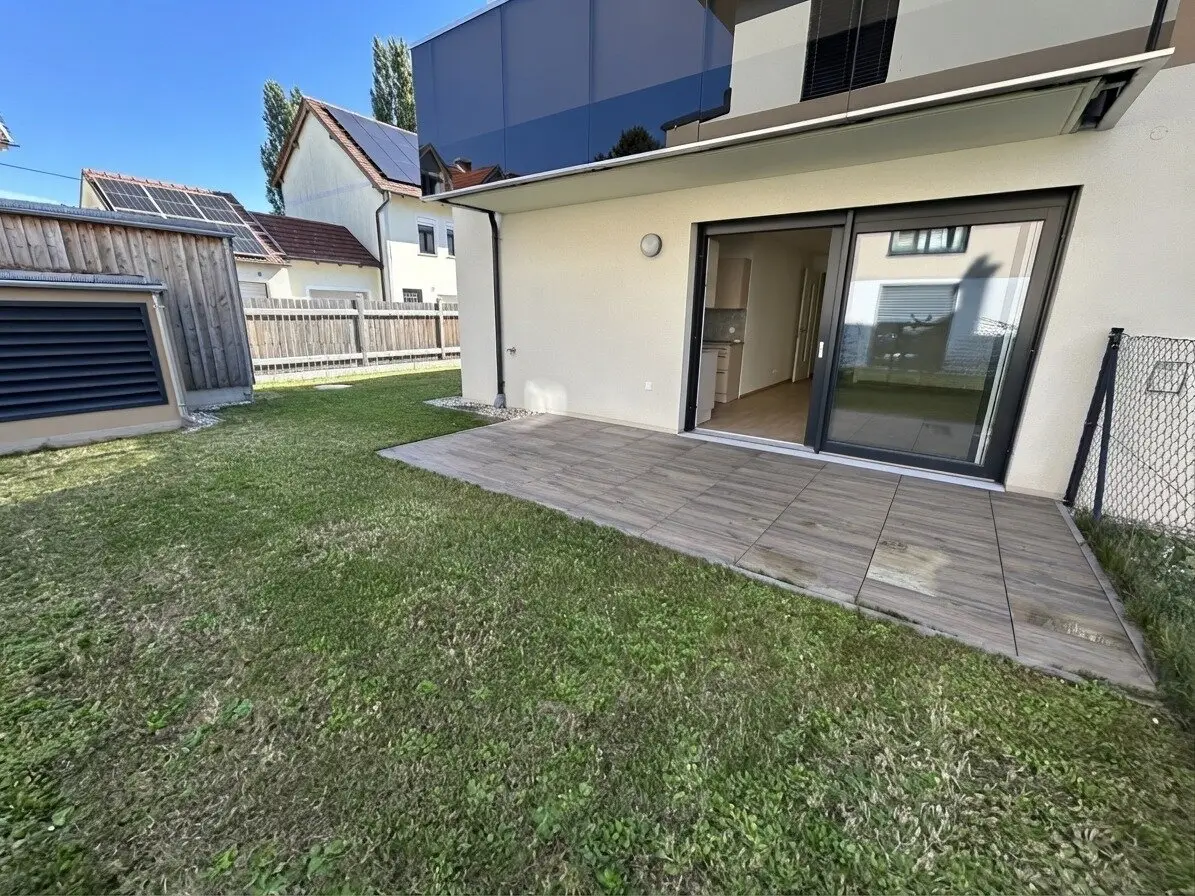 ERSTBEZUG - Gartenwohnung mit 2 Zimmer und   2 Garagenplätzen