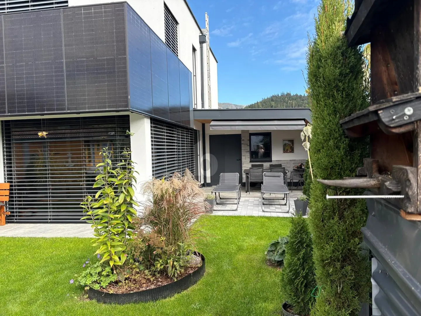 Smart family apartment with PV system and garden